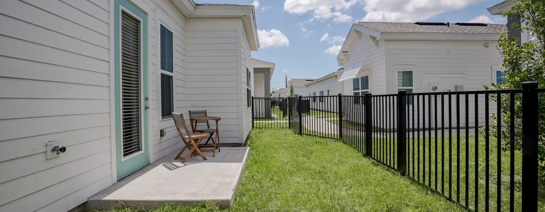 Backyard with Fence and lush grass